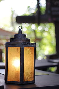 selective focus photography of gray and brown tubular lantern thumbnail