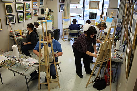 people painting inside room thumbnail