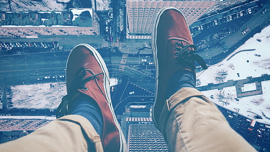 person wearing brown low-tops thumbnail