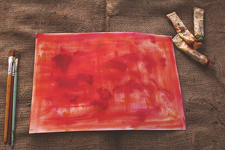 red paint on brown surface thumbnail
