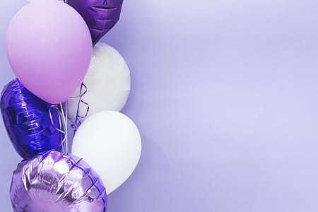 Purple Balloons On The Left Side Photo thumbnail