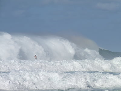 person surfing during daytime thumbnail