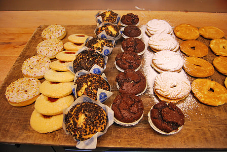 doughnuts and cookies on table thumbnail