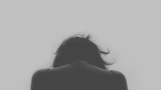 woman facing towards white background thumbnail
