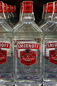 Smirnoff vodka bottle lot on black surface thumbnail