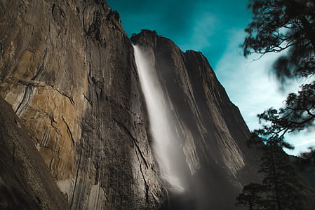 low angle photo of waterfall thumbnail