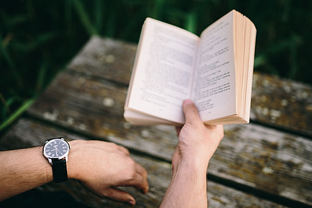 Reading book at lake thumbnail