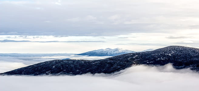 mountain covered by clouds thumbnail