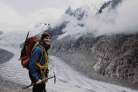 photo of man holding pick ax thumbnail
