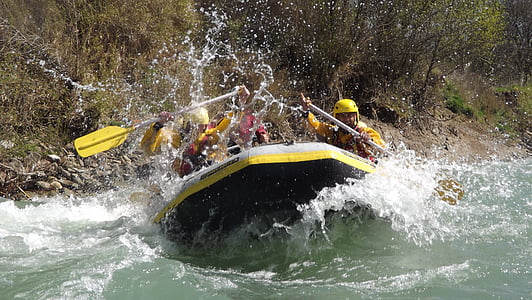 people riding on inflatable boat at daytime thumbnail