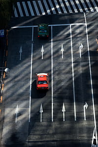 aerial view of red vehicle on road thumbnail