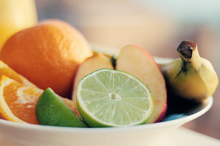 selective focus photography of bowl of fruits thumbnail