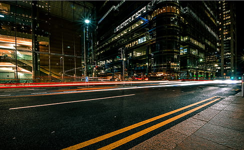 time-lapse photography of vehicles on road during nightime thumbnail