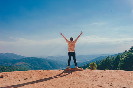 Woman Standing on Cliff thumbnail
