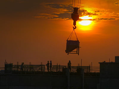 crane lifting brown wooden box thumbnail