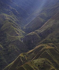 bird eye view photography of mountain cover by green trees thumbnail