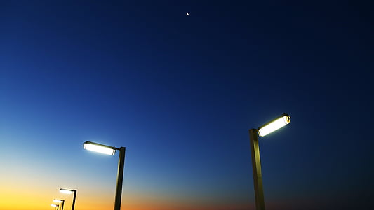 lighted post lamps at night thumbnail