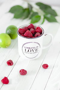 raspberries in ceramic mug thumbnail