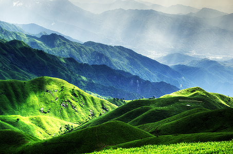 green mountains with crespular sunrays thumbnail