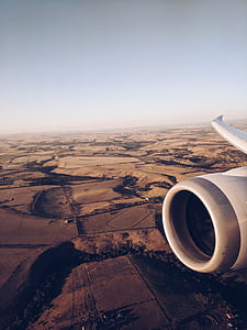 window plane view of airplane engine thumbnail