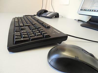 gray and black computer mouse beside keyboard thumbnail