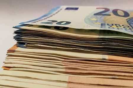Cash bank notes in pile thumbnail