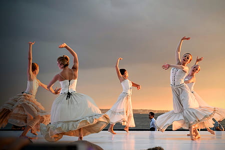 five woman dancing on stage thumbnail