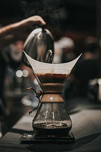 selective focus photography of coffee on cup thumbnail