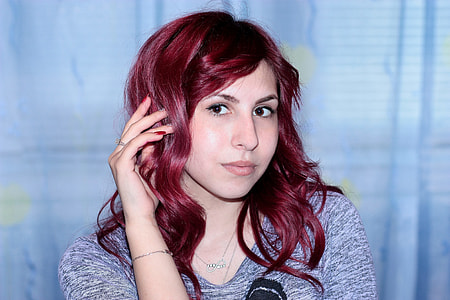red haired woman thumbnail