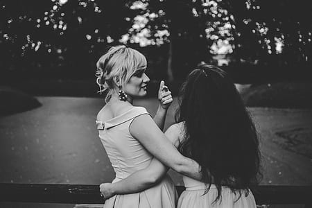 two women looking at each other thumbnail