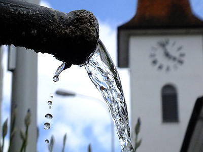 selective focus photography of pipe and water thumbnail