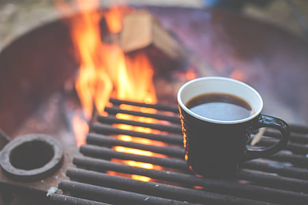 coffee in cup on black steel griller thumbnail