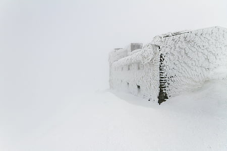snow covered house thumbnail