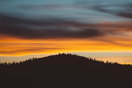 silhouette of mountain during sunset thumbnail