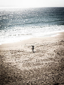 person standing near seashore thumbnail
