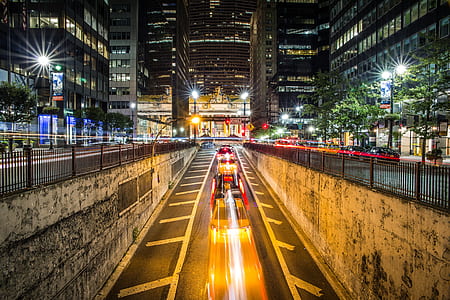 time lapse photo of moving cars thumbnail