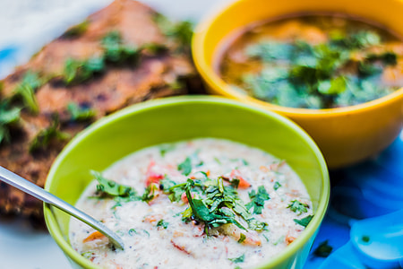soup in green bowl with spoon thumbnail