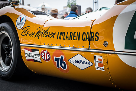 yellow racing car with stickers thumbnail