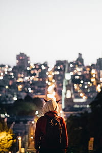 Horned Hood Watches Over City Photo thumbnail