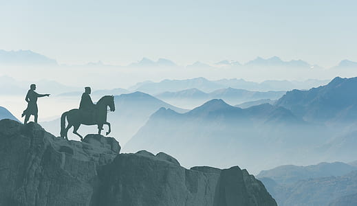 silhouette of horseman on mountain thumbnail