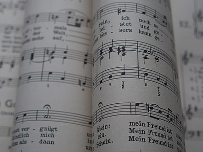 open musical note book page thumbnail