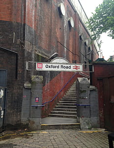 This is the secret entrance to Manchester Oxford Road railway station. It's located at the end of a cobbled street and up a flight of stairs. thumbnail