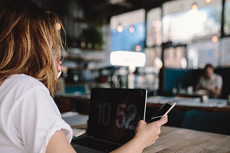 Young woman working in a cafe thumbnail