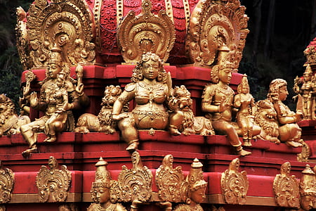 gold-colored Hindu deity figurine lot thumbnail