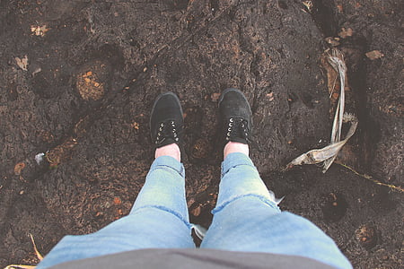 person standing on grey rock surface thumbnail