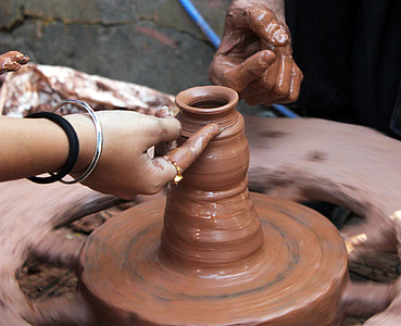 person pot making during daytime thumbnail