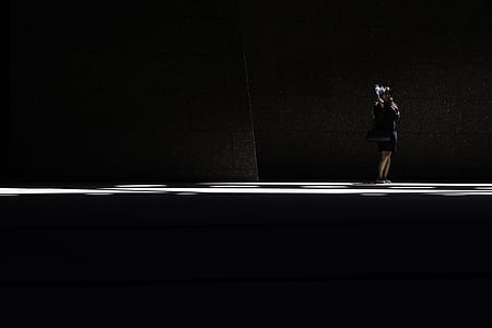 person standing on stage thumbnail