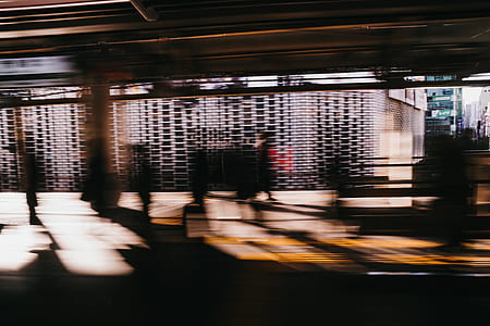 timelapse photography of people in subway at daytime thumbnail