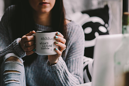 Girl drinking wine in her mug thumbnail