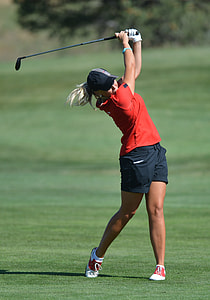 selective focus photography of female golf athlete thumbnail